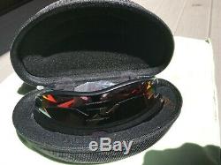 Men's Oakley Sunglasses, with hard case. Two lenses, one polarized, in hard case