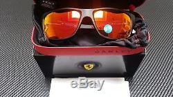 New Oakley Ferrari Jupiter Carbon with Ruby Iriduim Polarized Mens Sunglasses