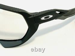 New Oakley Plazma Sunglasses Clear Black Photochromic Lens Carbon Frame Trans