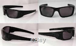 Oakley mens Sunglasses Fuel Cell Polished Black frame Warm Grey lenses New