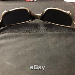 Oakley's Men's X-Metal Juliet Sunglasses Titanium Frame with Emerald lenses