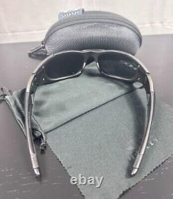 Sunglasses Oakley Pit Boss II 09137-01 with Black Polarized Lenses